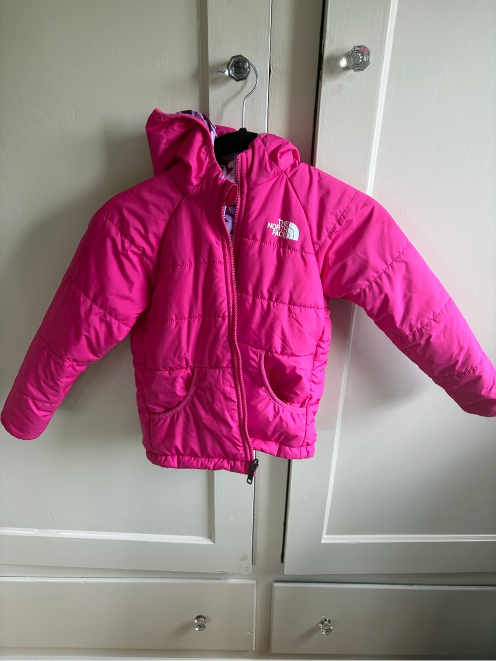 The North Face Kids' Hooded Puffy Jacket - reversible Bright Pink and floral